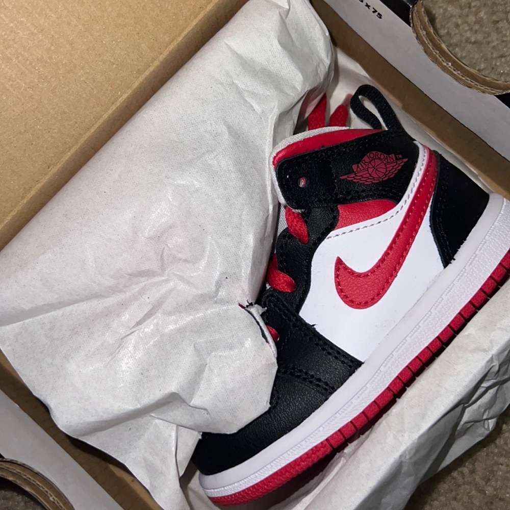 Black white and red Jordan 1